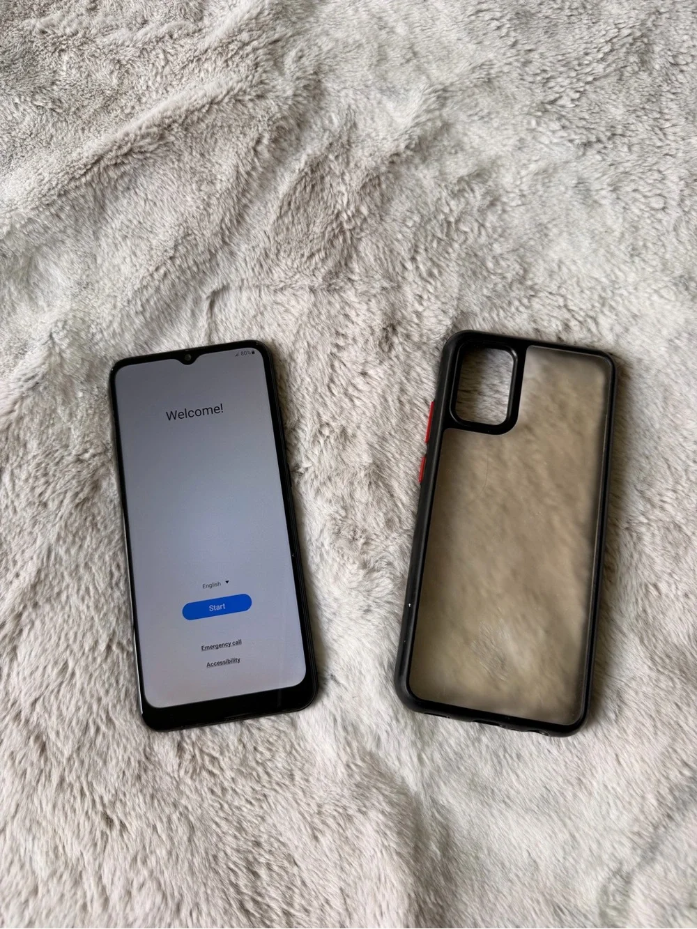 Samsung Black Smartphone with Blue Start Screen